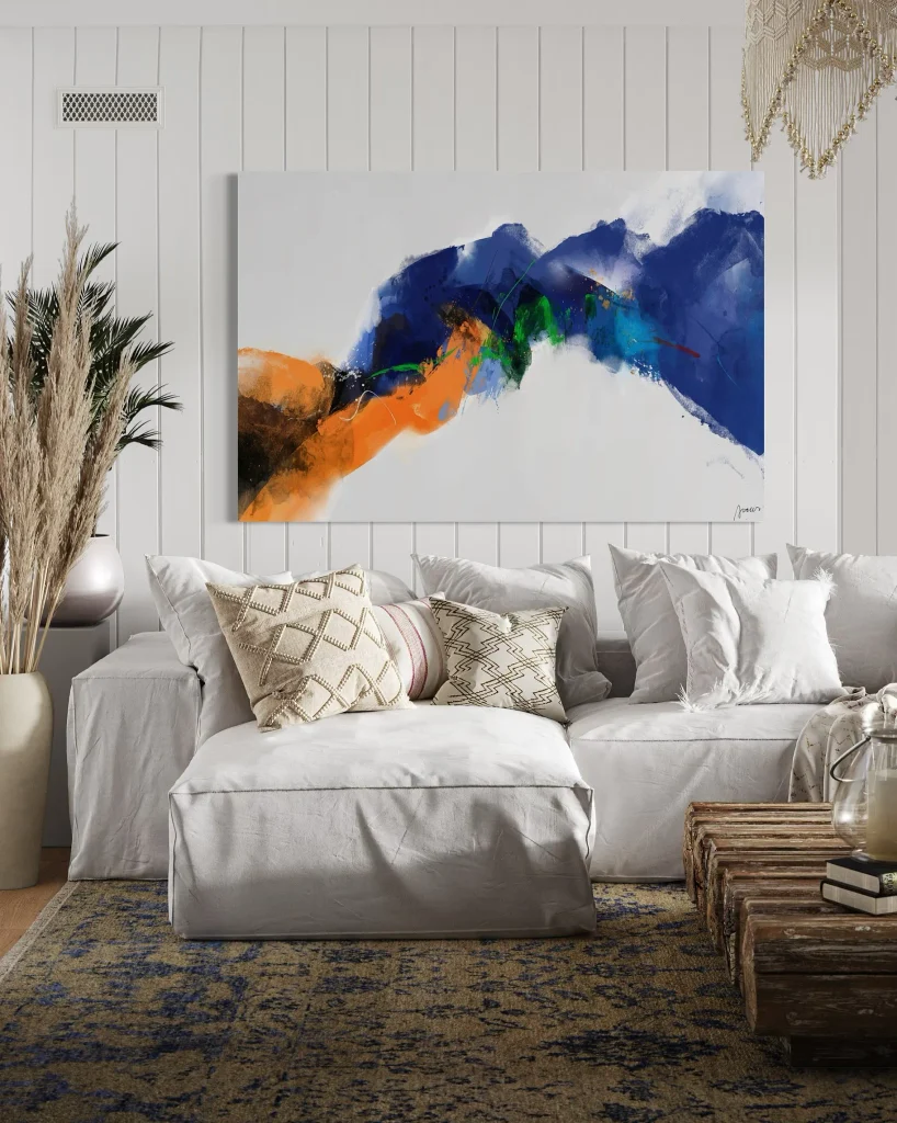 abstract wall art above a sofa in a living room