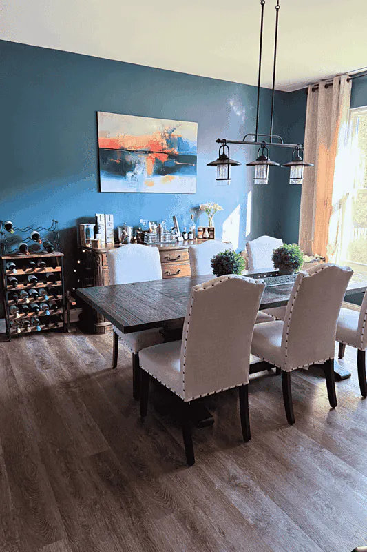 abstract wall art in a dining room space