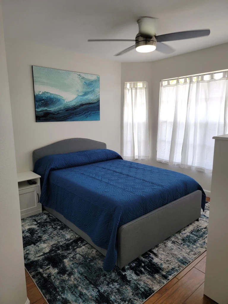 abstract wave wall art in a bedroom
