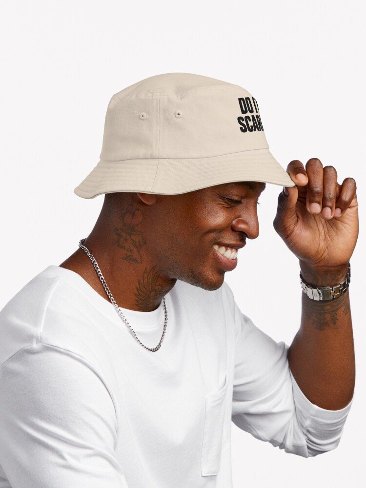 A man wearing "Do It Scared" Bold Typography Bucket Hat