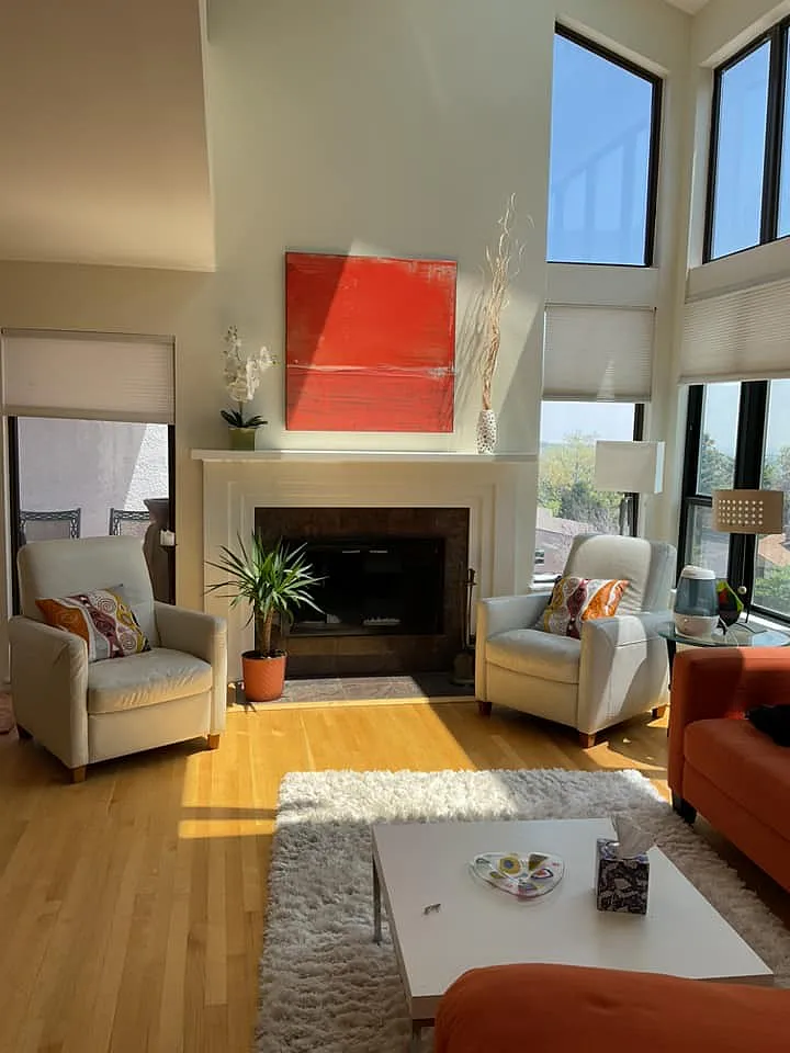 Orange Art wall art in a living room