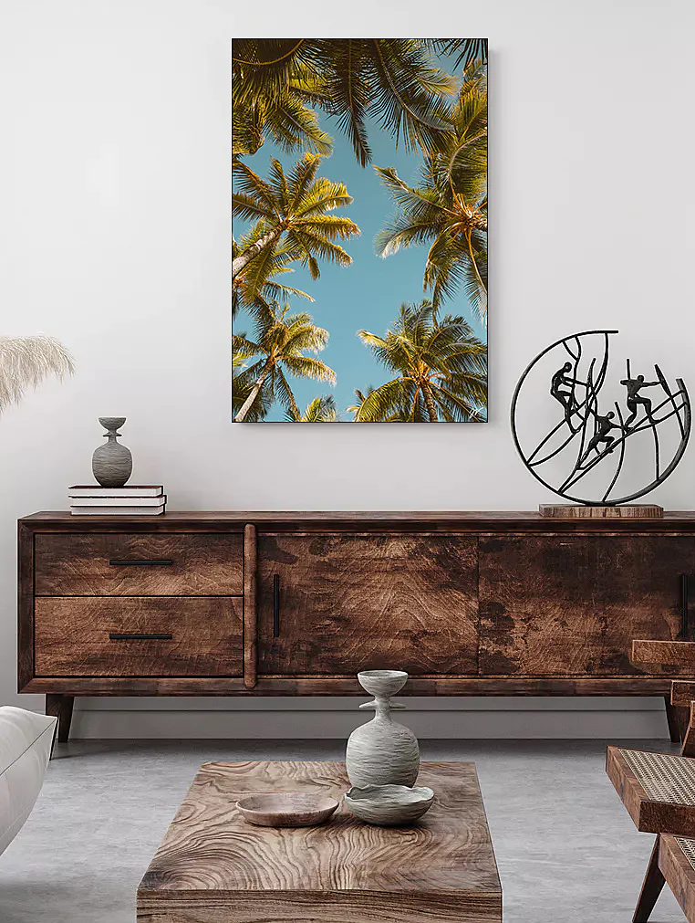 Palm Party wall art above a wood cabinet